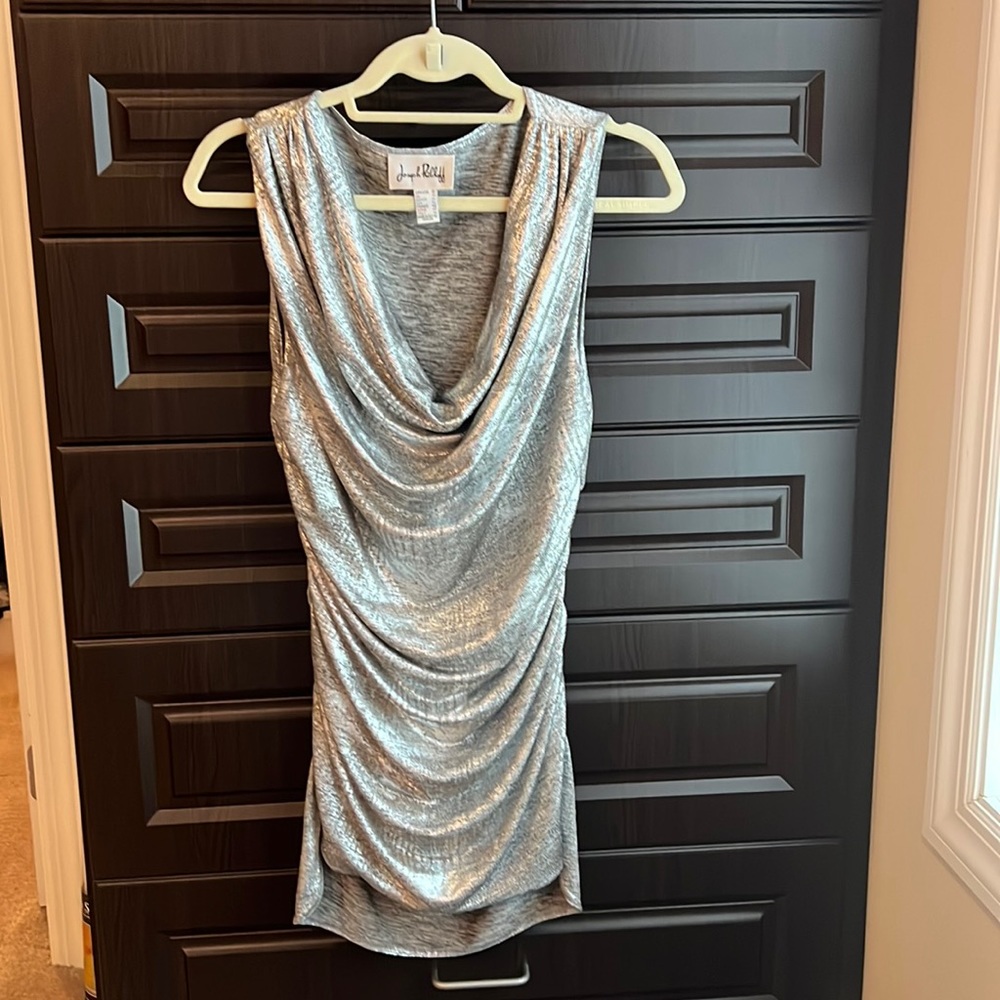 A beautiful Joseph Ribkoff size 12 long stretchy silver top